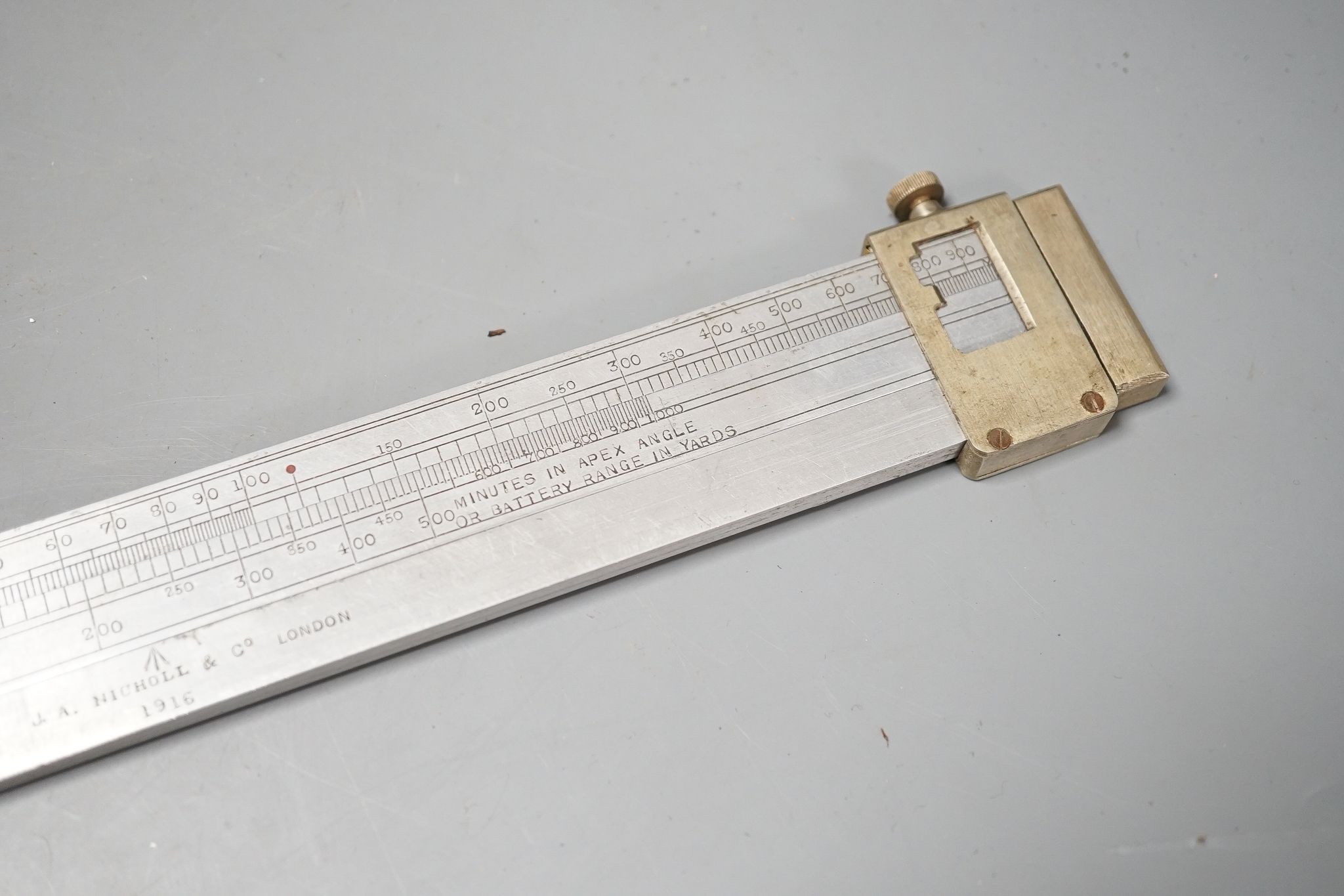 WWI artillery battery range calculator and similar Houghton-Butcher protractor, 1915/16